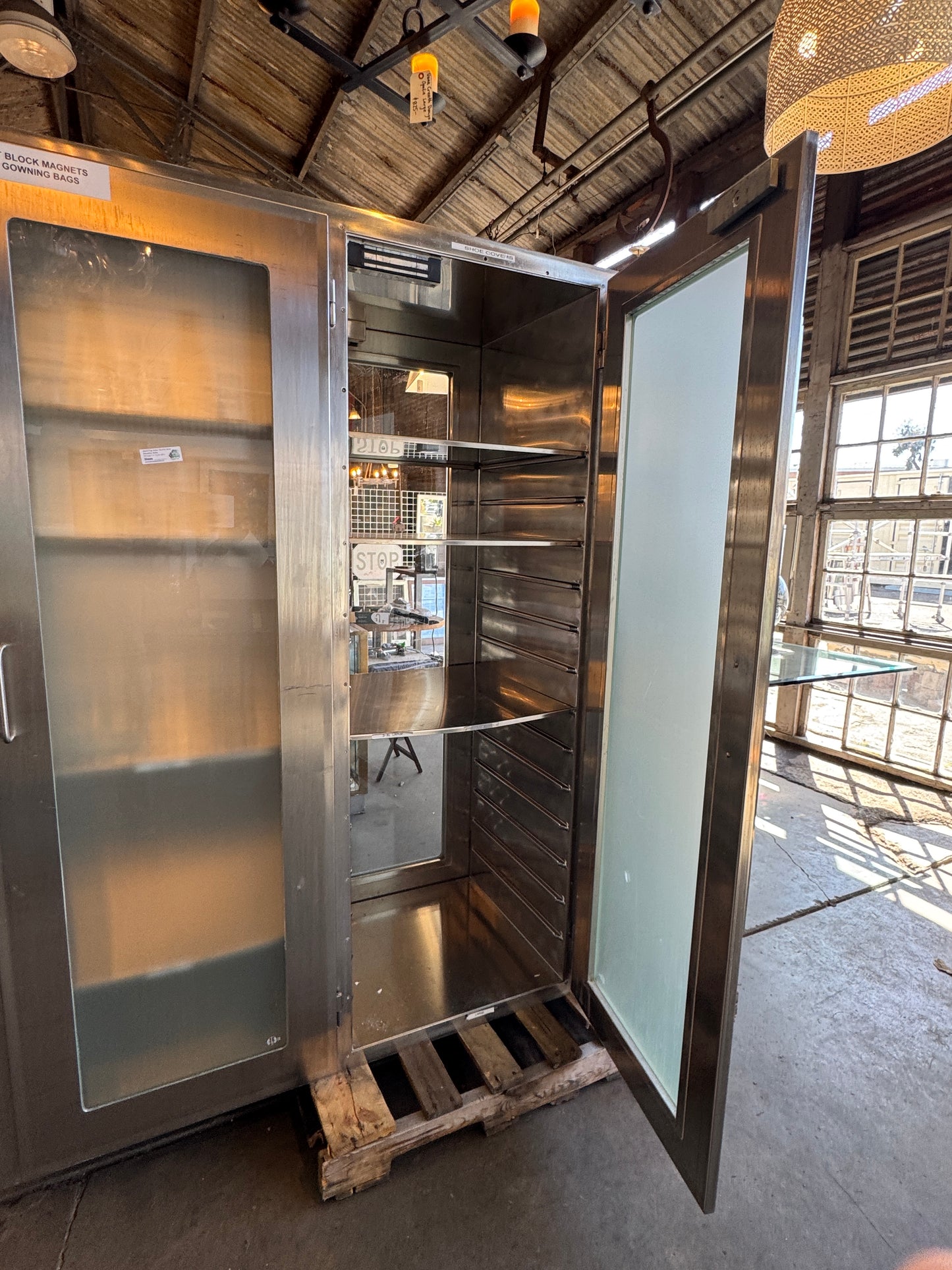 Reclaimed Stainless Steel And Glass Pass-Through Cabinets