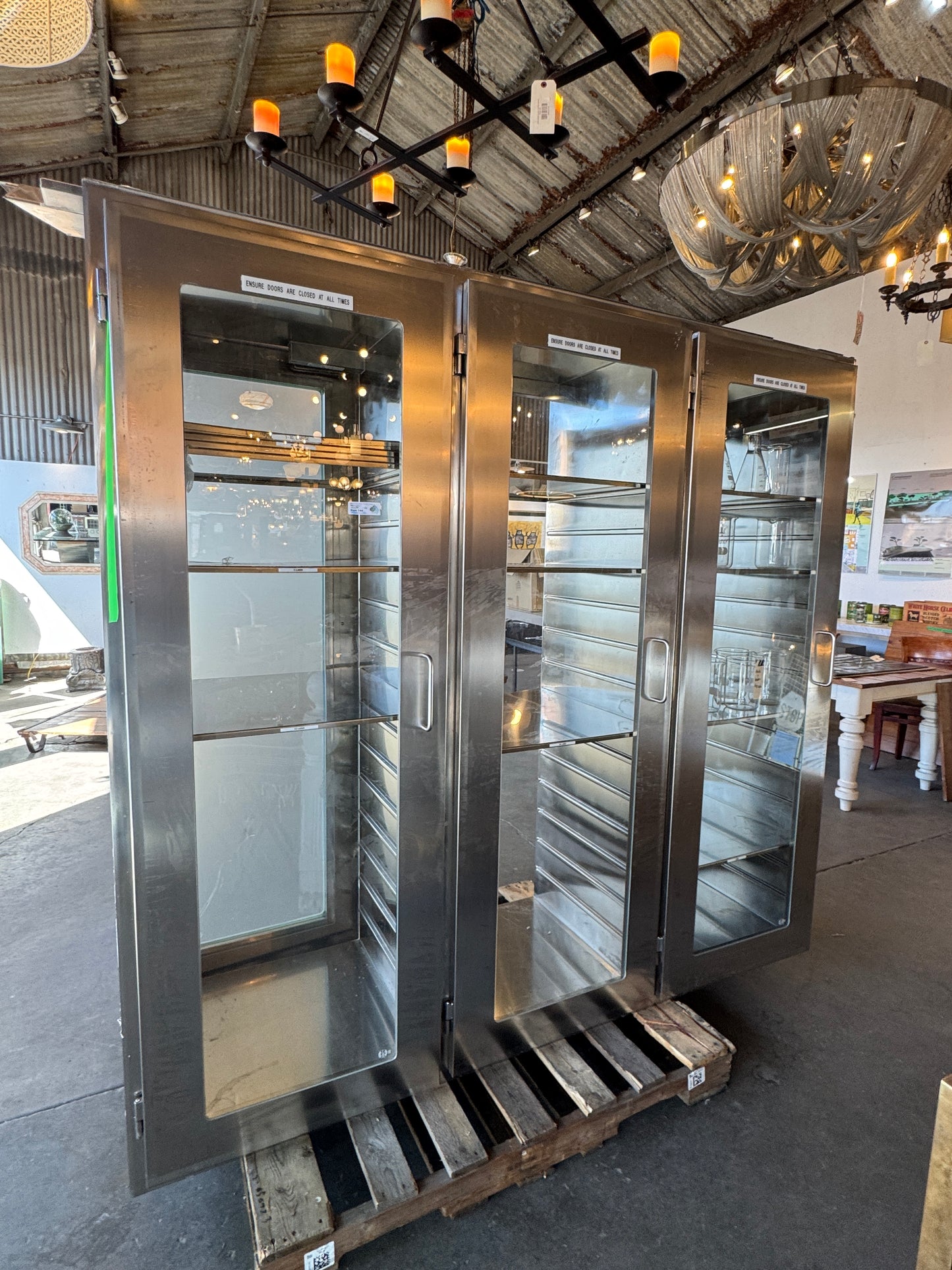 Reclaimed Stainless Steel And Glass Pass-Through Cabinets